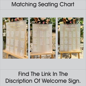 May include: Three acrylic wedding seating charts with gold lettering. The first chart says "Please find your seat" and lists names under the headings "A-B" and "C-D". The second chart says "Please find your seat" and lists names under the headings "E-F" and "G-H". The third chart says "Please find your seat" and lists names under the headings "Table 1" through "Table 15".