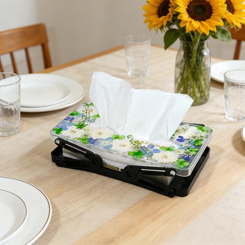 May include: A set of three ceramic nesting bowls. The largest bowl is light blue, the medium bowl is green, and the smallest is yellow. Each bowl has a smooth, glossy finish and a simple, modern design.