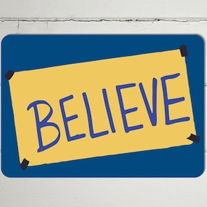 May include: A blue background with a yellow sticky note that says "BELIEVE" in purple handwriting.