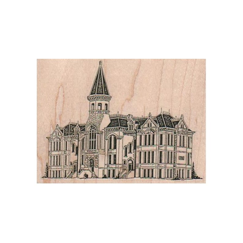 May include: A black and white line drawing of a large, ornate building with a central tower. The building has multiple windows and a detailed facade.