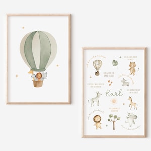 May include: Two framed watercolor prints. One features a green and white hot air balloon with animal passengers. The other print has animal illustrations and text, including the name "Karl". Both prints have a light wood frame.