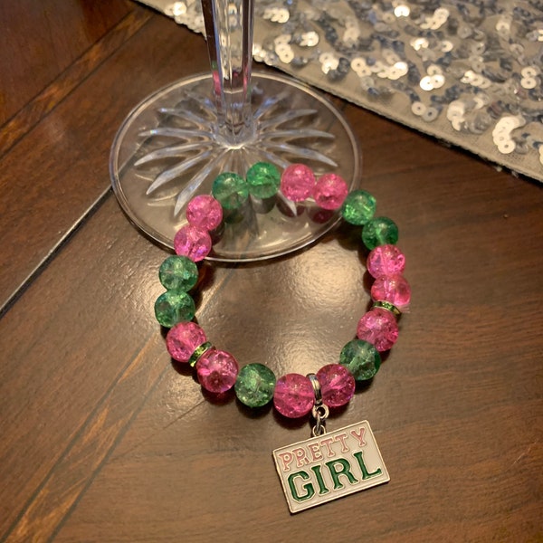 Pink And Green Stretch Bracelet.  Pretty Girl Charm. Great for any occasion.