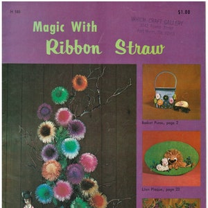 May include: A craft book titled "Magic With Ribbon Straw" with a colorful floral arrangement made with ribbon straw in a blue vase. The book cover also features a basket purse, a lion plaque, and a wisteria branch.