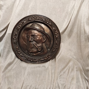 Man with pipe copper plate bronze plate casting embossed plate ornamental plate metal plate metal plate bronze brass copper