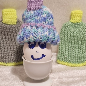 five crocheted egg warmers egg hats Easter egg warmers Easter