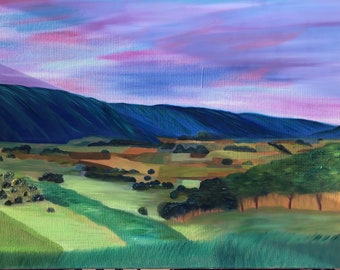 May include: A painting of a landscape with a mountain range in the background and a valley in the foreground. The sky is a vibrant purple with pink clouds. The valley is green with patches of brown and yellow. There are trees in the valley.