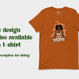 May include: An orange t-shirt featuring an illustration of a person meditating with the words "Find Your Inner Peace." The person is wearing a patterned top and skirt. The text "This design is also available as a t-shirt" is also visible.