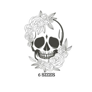May include: Black and white line art embroidery design of a skull with flowers. The skull has a diamond on its forehead. The text "6 SIZES" is below the image.