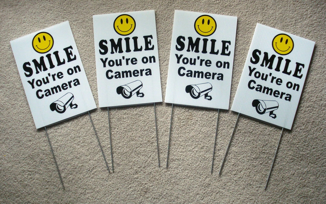 4 Smile You're on Camera Signs 8"x12" W/ Stakes Security Surveillance B ...