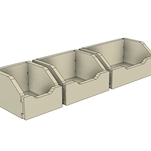 May include: Three beige wooden storage boxes with open fronts, stacked side by side. The boxes are made of wood and have a simple, rustic design.