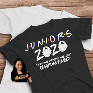 May include: Black t-shirt with the text "Juniors 2020" in a Friends-style font with colorful dots. The text "The one where we get quarantined" is below the main text. Two white face masks with black straps are above the text.