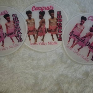 May include: Three white round patches with pink trim and the text "Congrats" in black. Each patch features a photo of three girls in pink dresses with the text "Samiyah Daniel" and "Jones Valley Middle" in black.