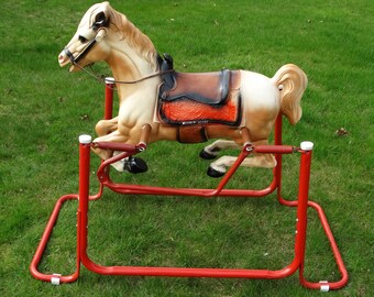 bouncing horse on wheels