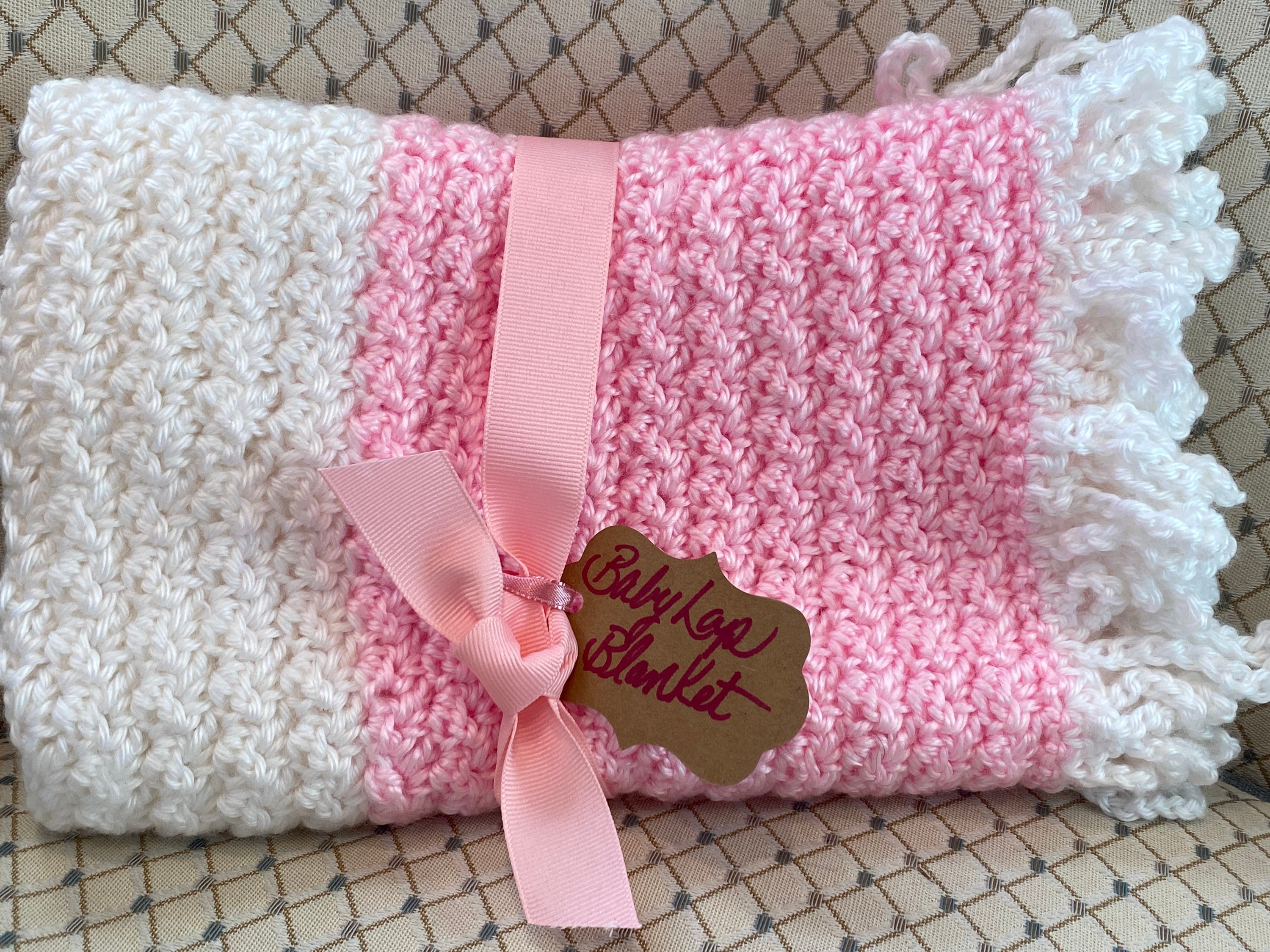 Pink and white hotsell knitted baby blanket
