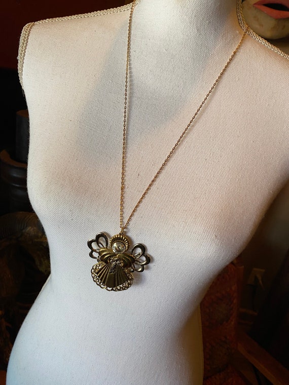 Avon angel necklace sale