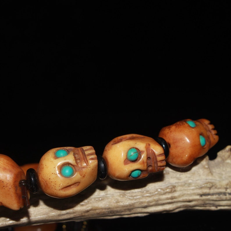 Early collection of gemstone ox bone skull dzi bracelet ornaments