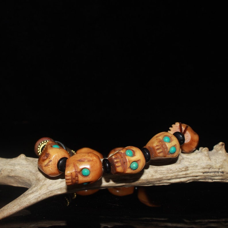 Early collection of gemstone ox bone skull dzi bracelet ornaments