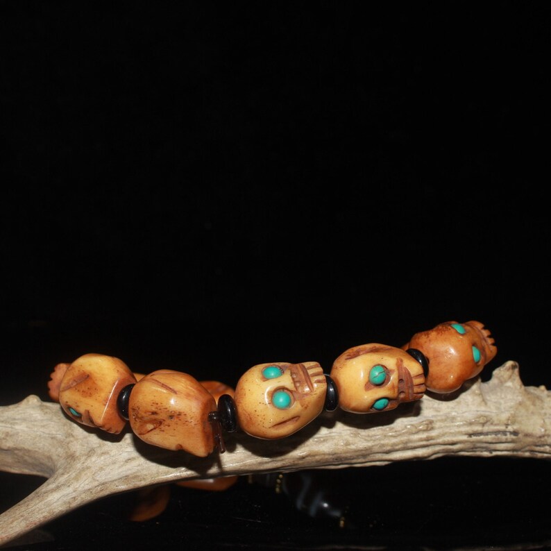 Early collection of gemstone ox bone skull dzi bracelet ornaments