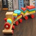 A wooden toy a wooden train 1-2-3-4-5-6 year-old toy develops intelligence 