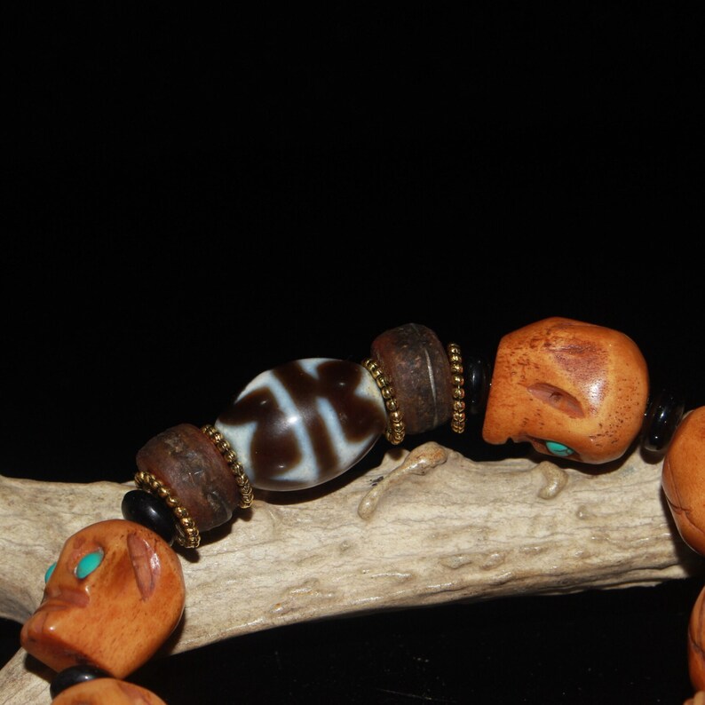 Early collection of gemstone ox bone skull dzi bracelet ornaments