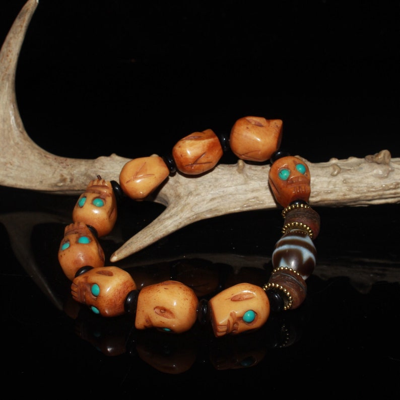 Early collection of gemstone ox bone skull dzi bracelet ornaments