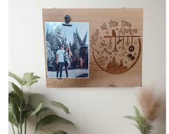 May include: A wooden photo frame with a laser-engraved design featuring the Hogwarts castle and the text "After all this time, Always". The frame has a photo of a couple in front of the Hogwarts castle.