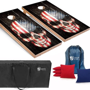 May include: Two wooden cornhole boards with a skull and American flag design. The boards are on a white background. The boards come with a black carrying bag, a blue drawstring bag, and six bean bags, three red and three blue.