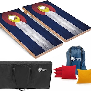 May include: Two wooden cornhole boards with a Colorado flag design. The boards are set up for play with a blue bag and red and yellow bean bags. The boards are made by Tailgating Pros.