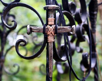 large cross pendant, three nails one cross