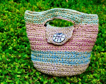 handmade crochet purse,  blacksmith made button, artist collaboration