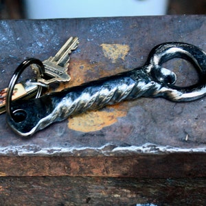 wapening flesopener sleutelhanger