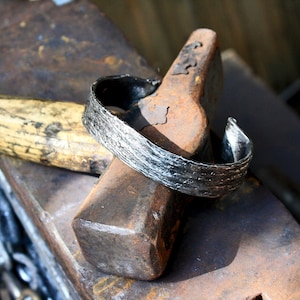 Hand forged iron bracelet
