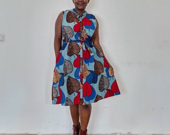 Blue dress, sleeveless dress, dress with pockets, dress with leaf prints