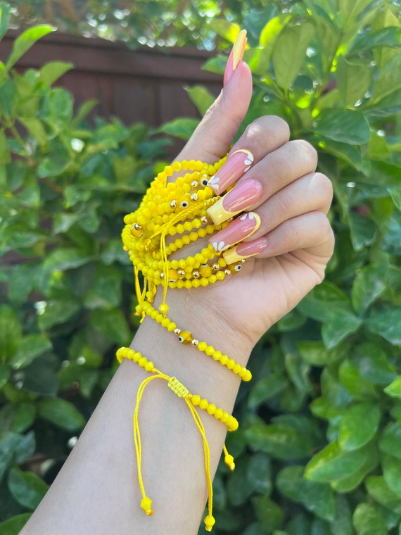 Yellow bracelet on sale