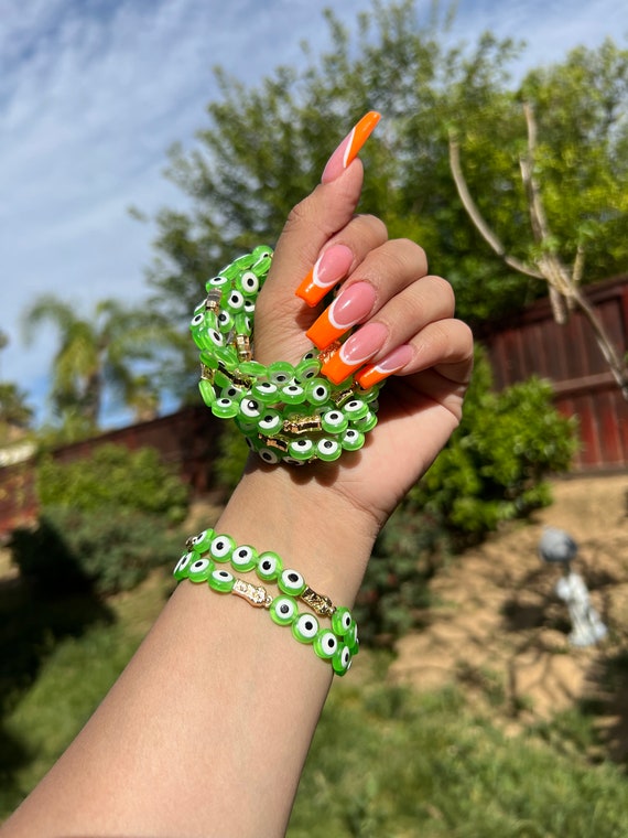 Green evil eye bracelet deals