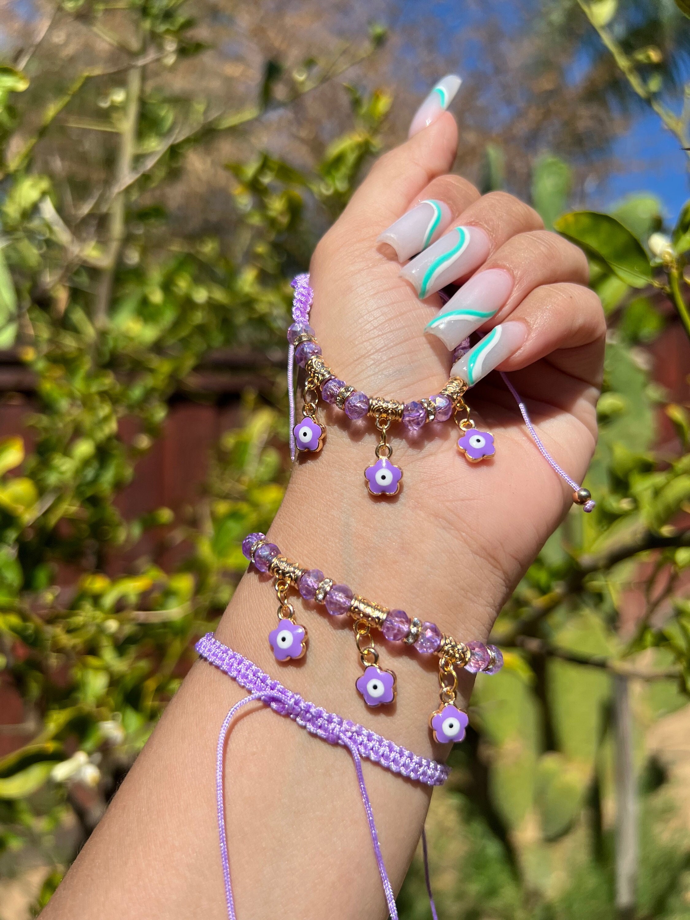 Purple evil eye bracelet discount