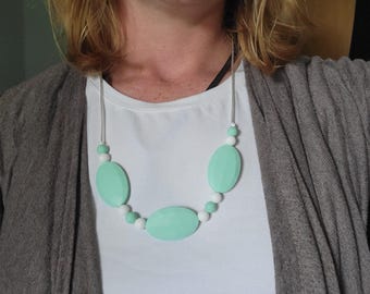 Collar de lactancia/amamantamiento ovalado de silicona