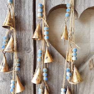Rustic windchime with cow bells and ceramic beads, bells on a string, carillon, mobile, wall hanging, brass jingle bell, beach wedding sea