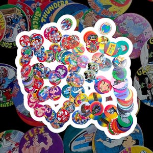 May include: A collection of colorful vintage pogs, featuring various cartoon characters, athletes, and text. The pogs are round, with a variety of designs and colors, including red, blue, green, and yellow. Some pogs have text like "THUNDER" and "FLEX".