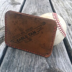 Cartera minimalista con forma de guante de béisbol