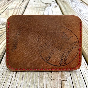 Cartera minimalista con manoplas de receptor de Jimmy Crane