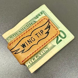 Pinza magnética para billetes de cuero con forma de guante de béisbol de Rawlings