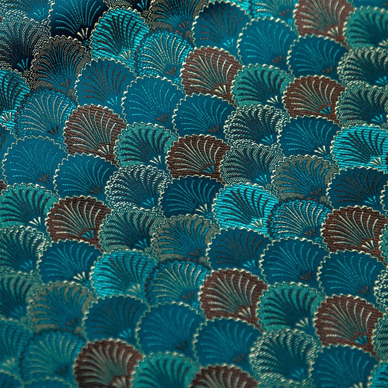May include: Teal fabric with a repeating pattern of stylized fans in shades of brown, teal, and gold.
