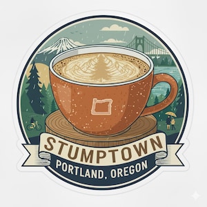 Peut inclure: Un autocollant représentant une tasse de café marron avec un motif de latte art, sur fond de montagne, de pont et de forêt. Le texte "STUMPTOWN PORTLAND, OREGON" est affiché sur une bannière sous la tasse.
