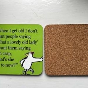 May include: Two square coasters. One is green with a cartoon chicken and the text: "When I get old I don't want people saying 'What a lovely old lady' I want them saying 'Oh crap, what's she up to now?'" The other is cork.