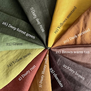 May include: A collection of fabric swatches arranged in a circular fan pattern, featuring colors labeled as 26) Deep forest green, 1) Dusty deep moss, 19) Yellows mustard, 20) Dark caramel, 21) Brown warm tan, 22) Grey brown, 23) chocolate, 3) Dusty Honey yellow, 2) Dusty rust, 24) Yellow moss, and 25) Green.