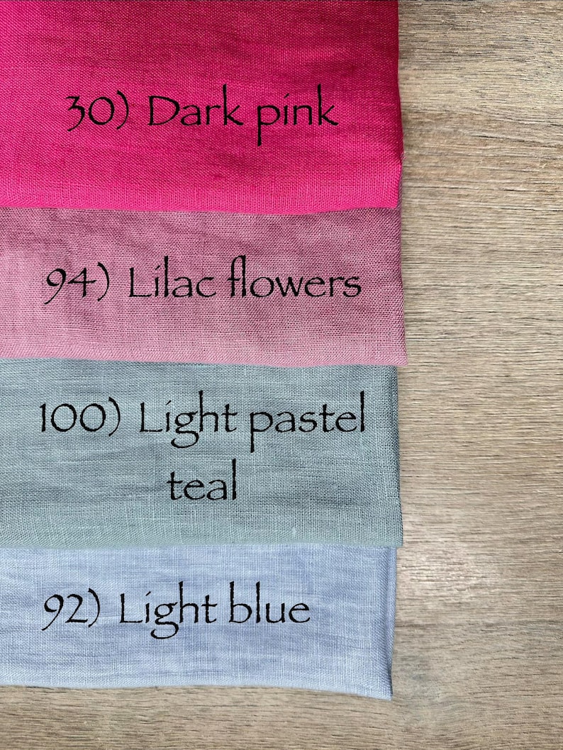 May include: Four rectangular fabric swatches stacked vertically. The top is dark pink labeled 30) Dark pink, the second is lilac labeled 94) Lilac flowers, the third is light pastel teal labeled 100) Light pastel teal, and the bottom is light blue labeled 92) Light blue.