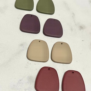 Solid gumdrop shape with circle studs