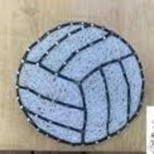 May include: A string art piece depicting a volleyball. The ball is made of white string with black string outlining the panels. The string art is mounted on a wooden surface.