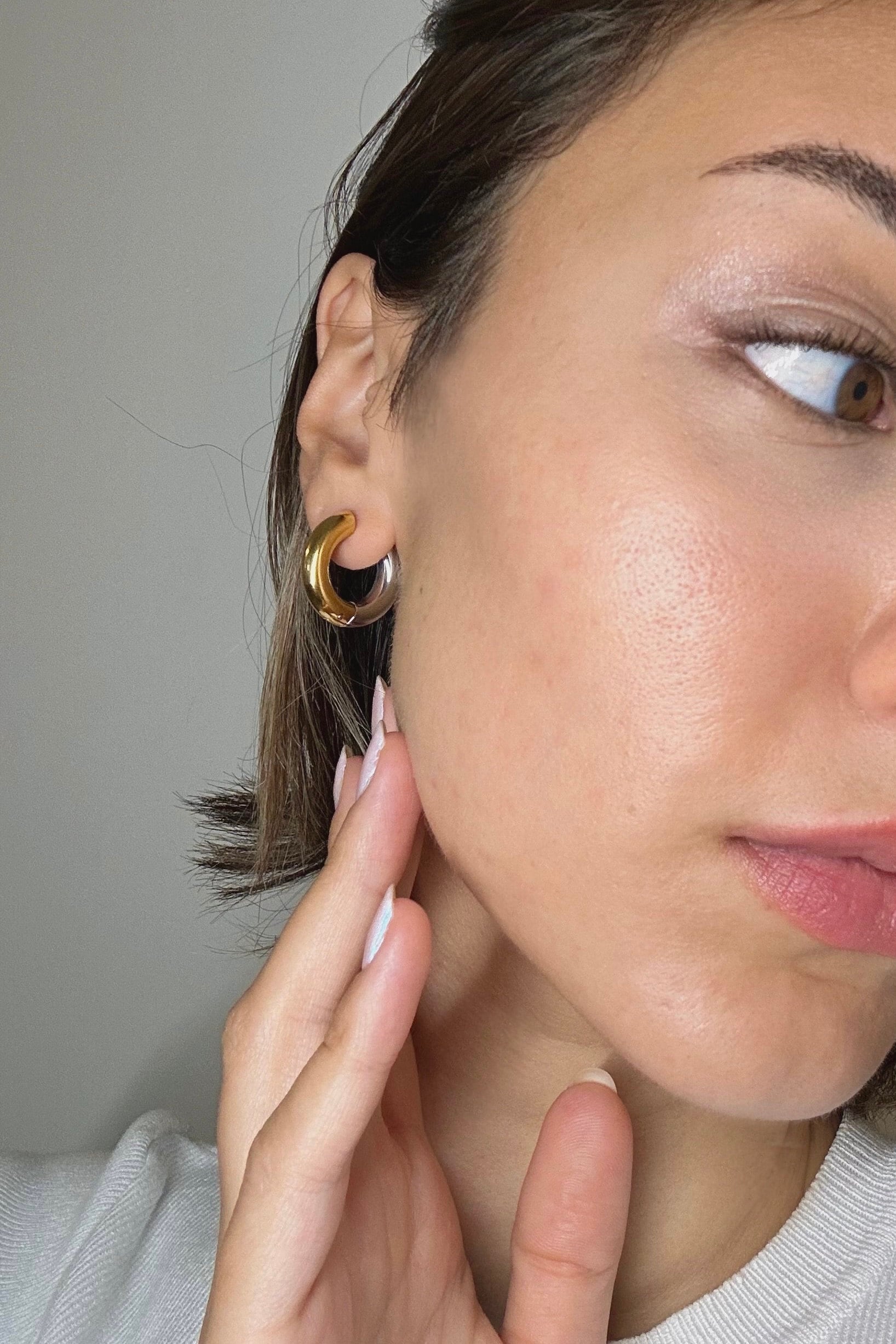 Two tone huggie outlet hoop earrings
